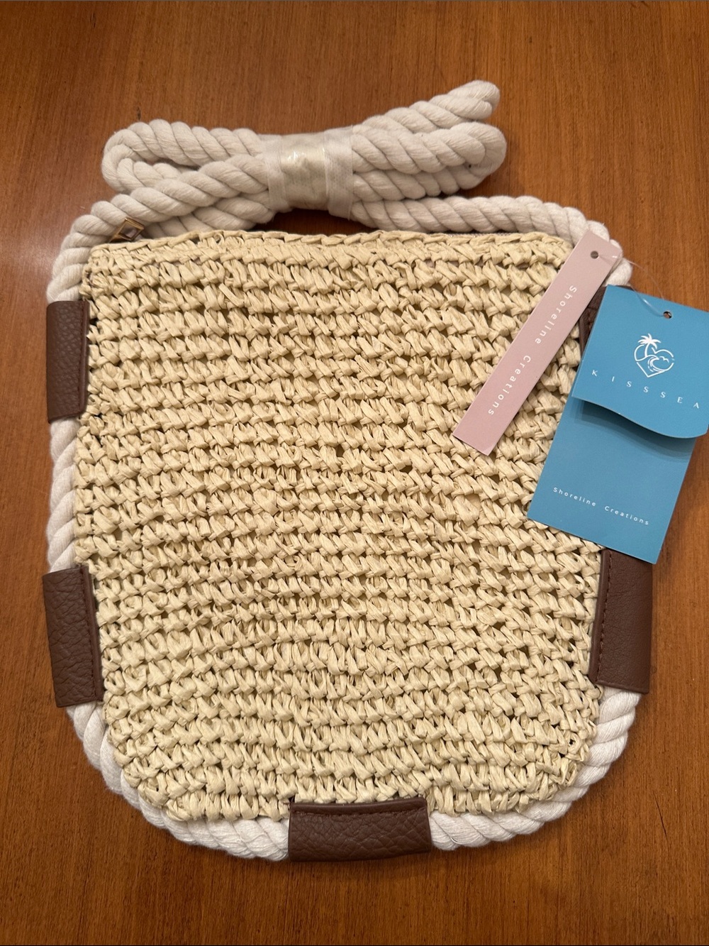 Kiss Sea woven straw crossbody bag